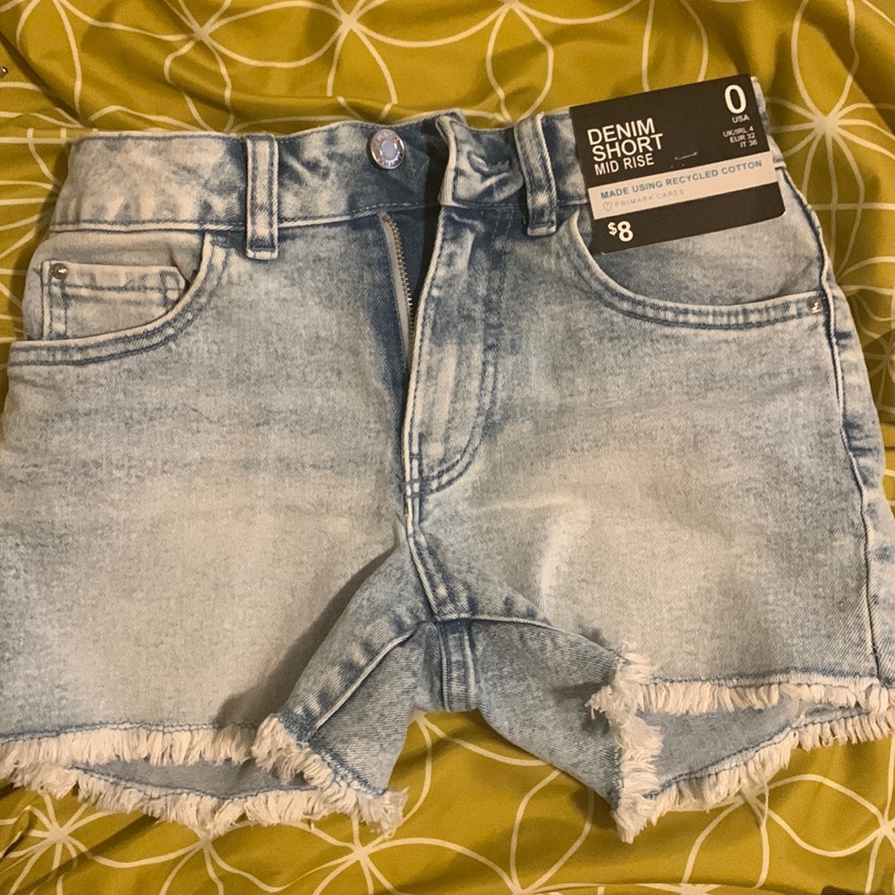 Light blue mid rise denim shorts